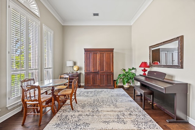 508 Wellington Rd, Coppell, TX 75019 - dining space featuring ornamental molding, dark wood finished floors, and baseboards