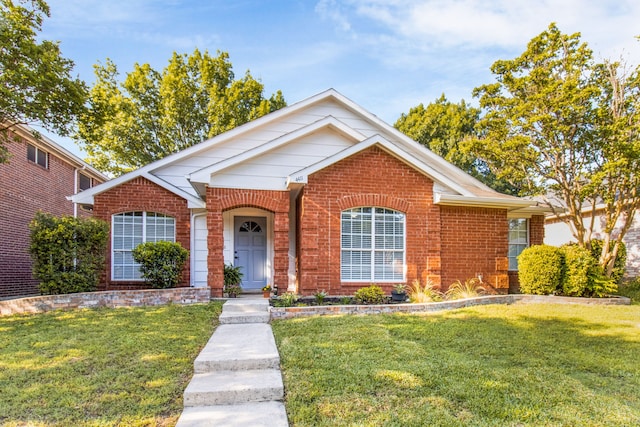 4411 Cordova Ln, Mckinney, TX 75070 - view of front of home featuring brick siding and a front lawn