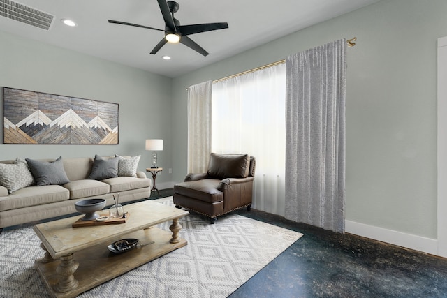 400 Round Up Ct, Stephenville, TX 76401 - living area with baseboards, a ceiling fan, recessed lighting, and finished concrete flooring