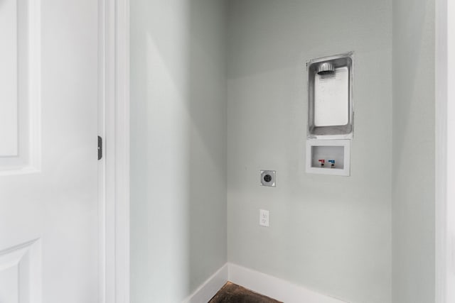 400 Round Up Ct, Stephenville, TX 76401 - laundry area featuring electric dryer hookup, hookup for a washing machine, and baseboards