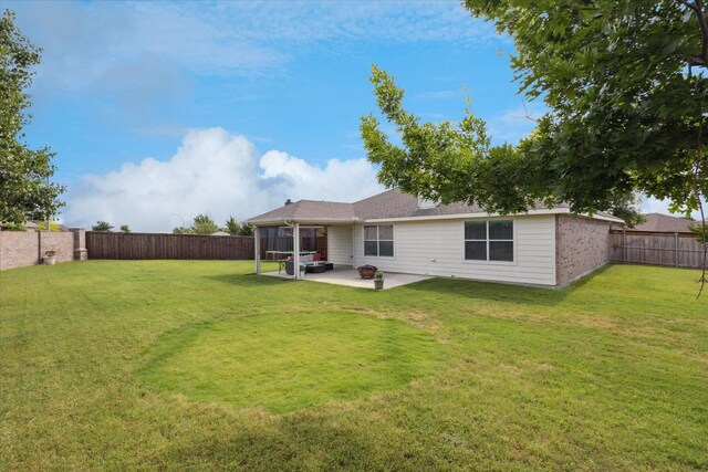 14065 Tanglebrush Trl, Fort Worth, TX 76052 - back of property featuring a patio area