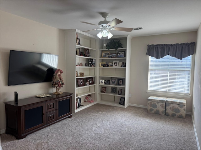 135 Freedom Ct, Rockwall, TX 75032 - living area with carpet, a ceiling fan, and baseboards