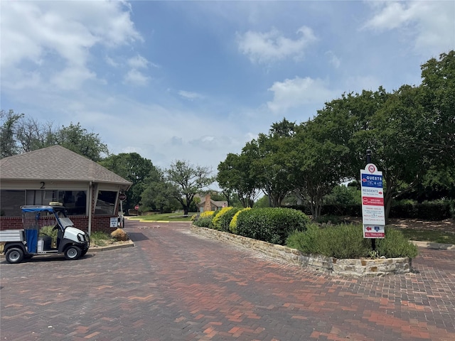 135 Freedom Ct, Rockwall, TX 75032 - view of decorative street featuring curbs