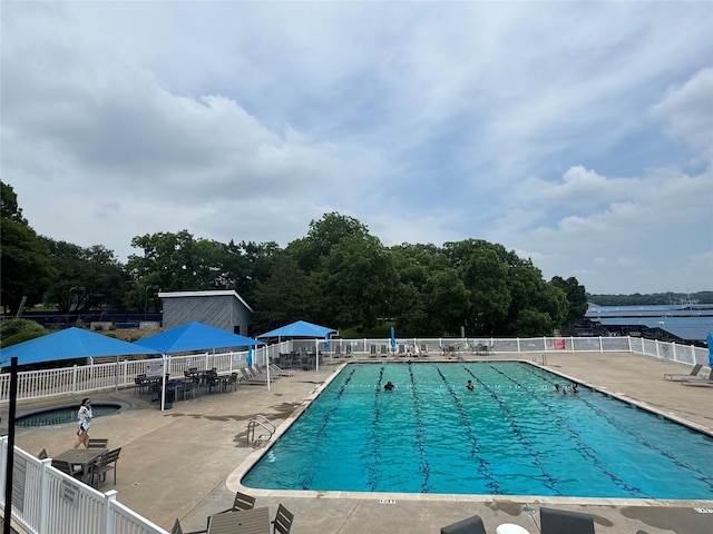 135 Freedom Ct, Rockwall, TX 75032 - community pool featuring a patio area