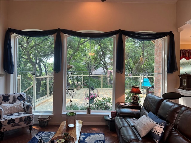 135 Freedom Ct, Rockwall, TX 75032 - living room with plenty of natural light, wood finished floors, and baseboards