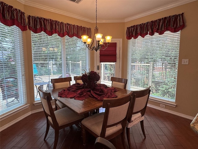 135 Freedom Ct, Rockwall, TX 75032 - dining room featuring baseboards, a chandelier, plenty of natural light, and ornamental molding