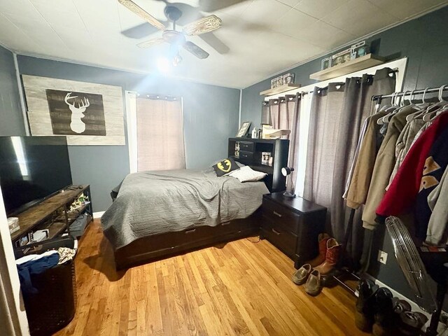 1103 Albert Broadfoot St, Bonham, TX 75418 - bedroom featuring wood finished floors and ceiling fan