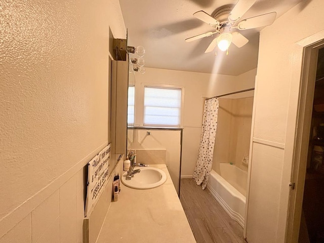 1103 Albert Broadfoot St, Bonham, TX 75418 - full bathroom featuring wood finished floors, ceiling fan, shower / bath combination with curtain, and vanity
