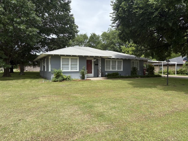 1103 Albert Broadfoot St, Bonham, TX 75418 - view of front of home with a front lawn