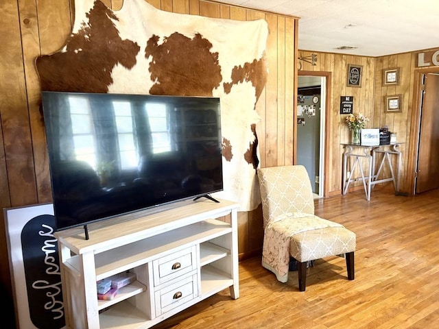 1103 Albert Broadfoot St, Bonham, TX 75418 - living area featuring wood finished floors and wooden walls