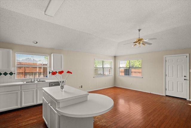 1214 Meadowbend Ct, Allen, TX 75002 - kitchen with a sink, a textured ceiling, dark wood finished floors, ceiling fan, and light countertops