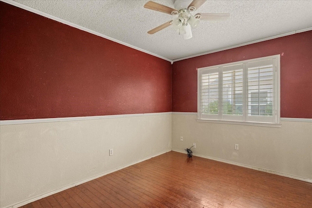 1214 Meadowbend Ct, Allen, TX 75002 - spare room with hardwood / wood-style flooring, a textured ceiling, ceiling fan, and baseboards