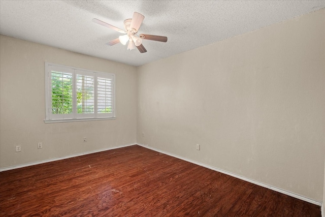 1214 Meadowbend Ct, Allen, TX 75002 - unfurnished room with wood finished floors, a textured ceiling, a ceiling fan, and baseboards