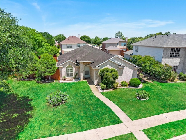 1214 Meadowbend Ct, Allen, TX 75002 - traditional-style house with a front yard and brick siding