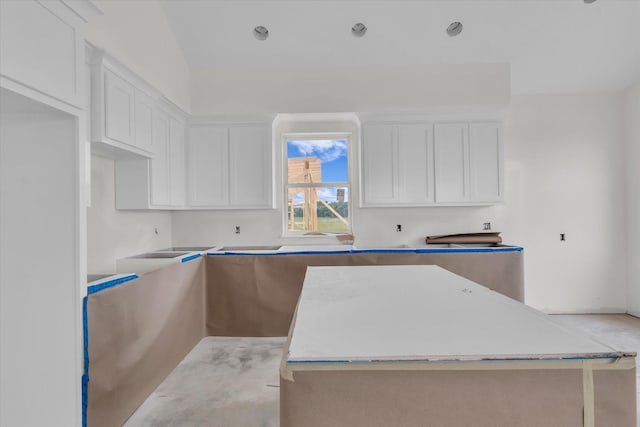132 S Baese Rd, Elm Mott, TX 76640 - kitchen featuring white cabinetry and a center island