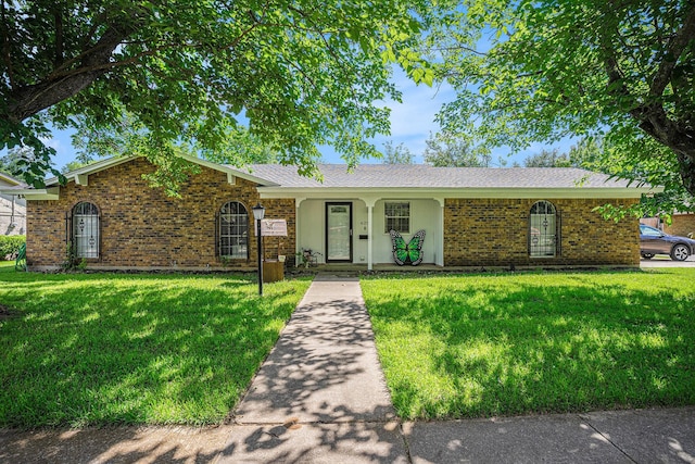 629 Barbara Ln, Burleson, TX 76028 - ranch-style house featuring a front lawn and brick siding
