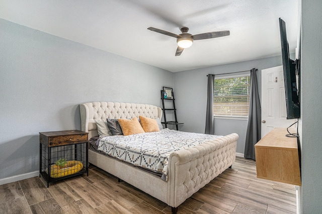 629 Barbara Ln, Burleson, TX 76028 - bedroom featuring light wood finished floors, baseboards, and ceiling fan