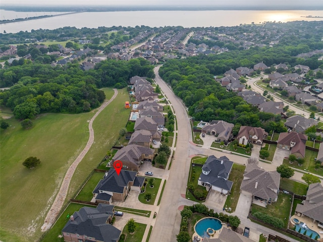 611 Southwestern Dr, Rockwall, TX 75087 - aerial view of property and surrounding area with a large body of water and nearby suburban area
