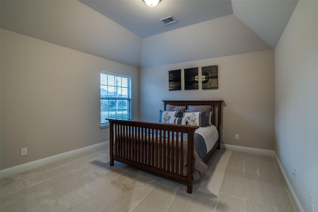 611 Southwestern Dr, Rockwall, TX 75087 - bedroom featuring light colored carpet, vaulted ceiling, and baseboards