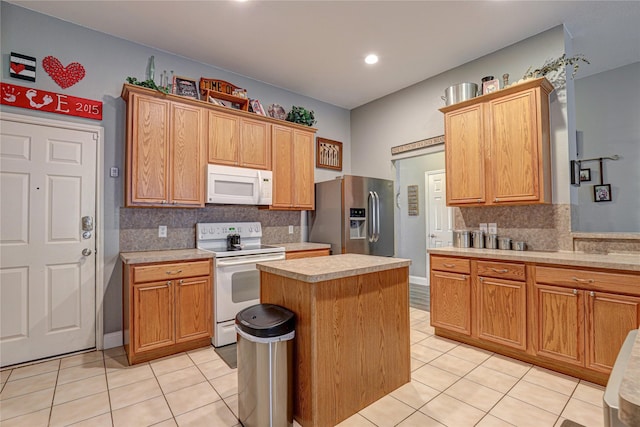 544 Bent Oak Dr, Fort Worth, TX 76131 - kitchen with white appliances, light tile patterned flooring, a center island, backsplash, and recessed lighting