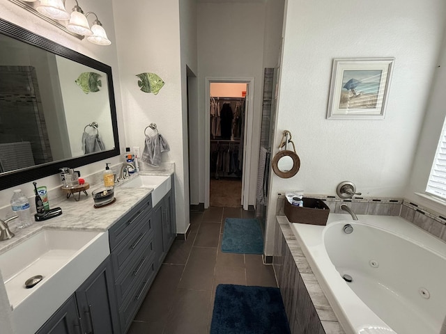 544 Bent Oak Dr, Fort Worth, TX 76131 - full bathroom featuring tile patterned flooring, a walk in closet, a whirlpool tub, and double vanity