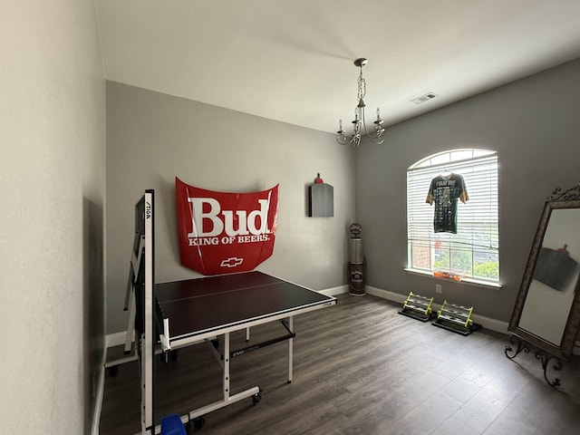 544 Bent Oak Dr, Fort Worth, TX 76131 - playroom with wood finished floors, baseboards, and a chandelier