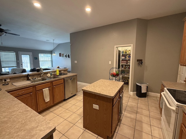 544 Bent Oak Dr, Fort Worth, TX 76131 - kitchen with stainless steel dishwasher, a sink, white electric range, brown cabinetry, and a ceiling fan