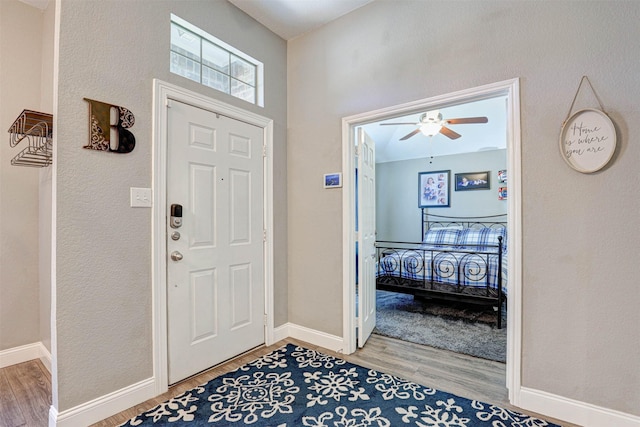 544 Bent Oak Dr, Fort Worth, TX 76131 - entrance foyer with light wood-style floors, a ceiling fan, and baseboards