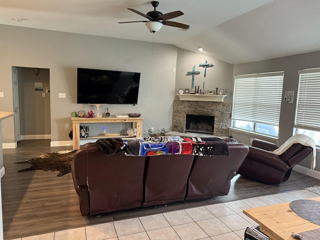 544 Bent Oak Dr, Fort Worth, TX 76131 - living area featuring ceiling fan, a stone fireplace, lofted ceiling, wood finished floors, and baseboards