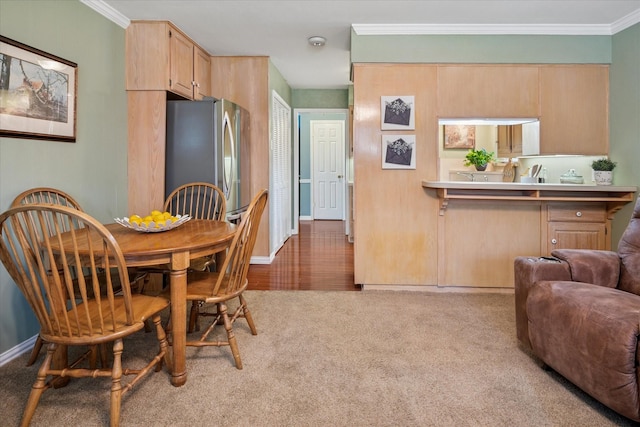 2827 Pritchett Dr, Irving, TX 75061 - carpeted dining room featuring ornamental molding and baseboards