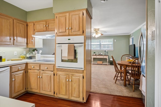 2827 Pritchett Dr, Irving, TX 75061 - kitchen featuring white appliances, ceiling fan, under cabinet range hood, light countertops, and dark wood finished floors