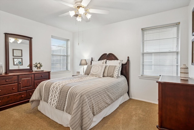 2827 Pritchett Dr, Irving, TX 75061 - bedroom featuring light carpet, a ceiling fan, and baseboards