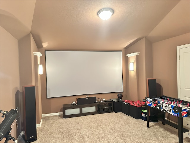 7239 Clementine Dr, Irving, TX 75063 - home theater featuring carpet, vaulted ceiling, and baseboards