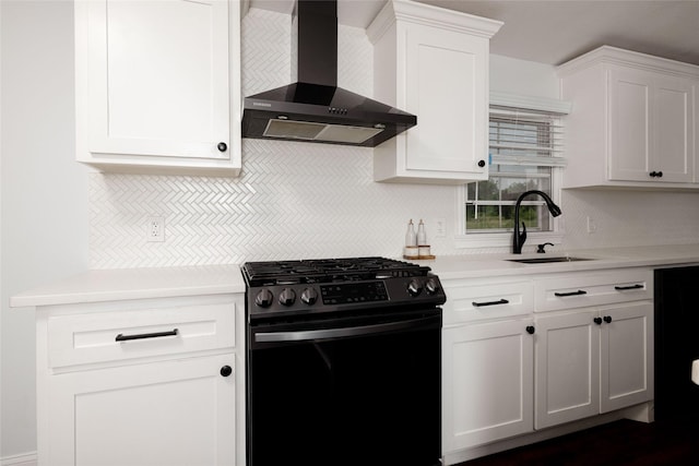 24882 US Highway 377, Whitesboro, TX 76273 - kitchen featuring stainless steel gas range, wall chimney range hood, decorative backsplash, light countertops, and a sink