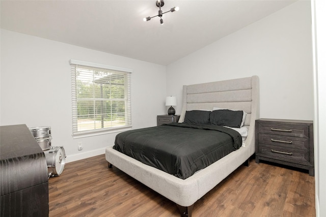 24882 US Highway 377, Whitesboro, TX 76273 - bedroom with dark wood-style flooring, baseboards, and vaulted ceiling