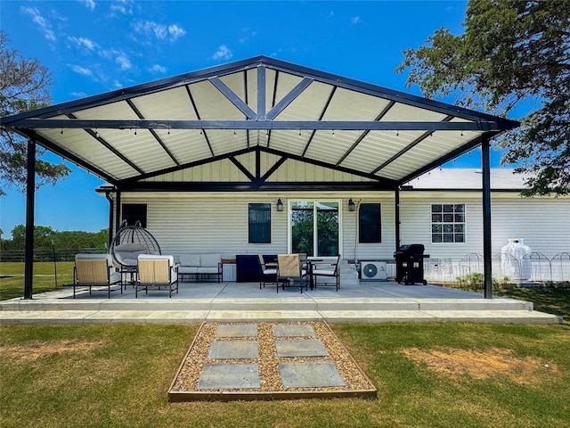 24882 US Highway 377, Whitesboro, TX 76273 - back of property with a patio area and an outdoor living space