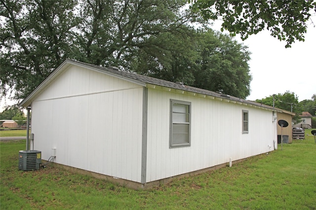 1815 Pelican W, Pelican Bay, TX 76020 - view of side of property featuring a lawn and central AC