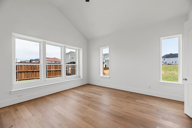 1758 Cousins Trl, Frisco, TX 75034 - spare room with vaulted ceiling, light wood-type flooring, and baseboards