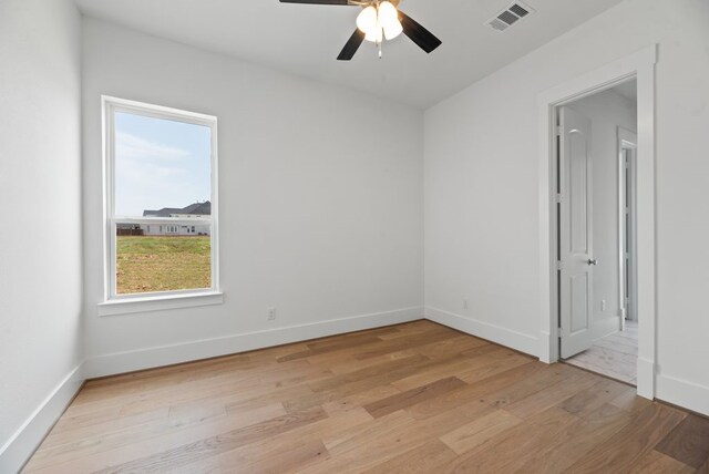 1758 Cousins Trl, Frisco, TX 75034 - unfurnished room featuring light wood-style floors, healthy amount of natural light, ceiling fan, and baseboards