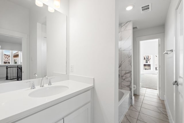 1758 Cousins Trl, Frisco, TX 75034 - bathroom with vanity, toilet, marble finish floors, and recessed lighting