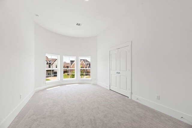 1758 Cousins Trl, Frisco, TX 75034 - carpeted spare room featuring a high ceiling and baseboards