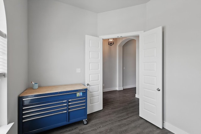 4121 Crossroads Ct, Oak Point, TX 75068 - unfurnished room with arched walkways and dark wood-style floors