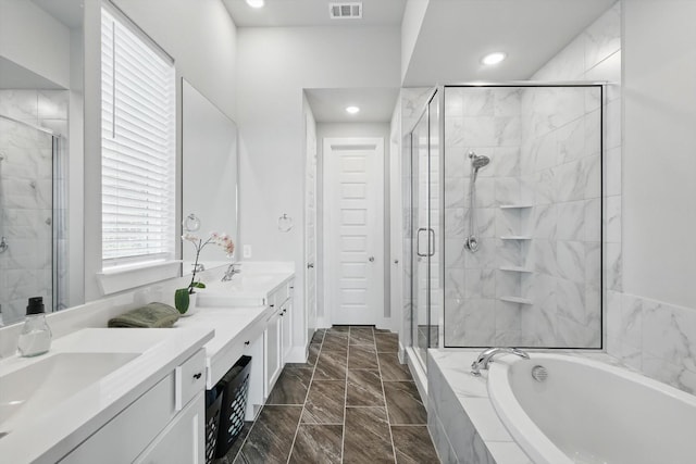 4121 Crossroads Ct, Oak Point, TX 75068 - bathroom featuring double vanity, a garden tub, a stall shower, recessed lighting, and marble finish floors