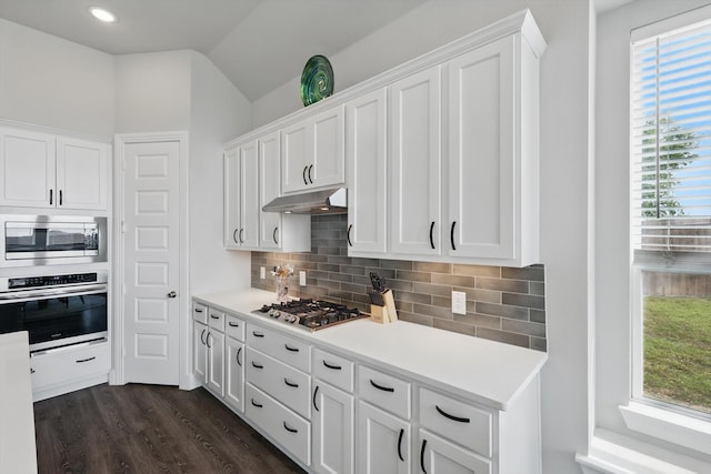 4121 Crossroads Ct, Oak Point, TX 75068 - kitchen with appliances with stainless steel finishes, white cabinets, light countertops, vaulted ceiling, and recessed lighting