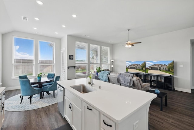 4121 Crossroads Ct, Oak Point, TX 75068 - kitchen featuring stainless steel dishwasher, dark wood-style flooring, white cabinetry, recessed lighting, and ceiling fan