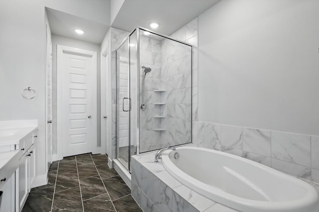 4121 Crossroads Ct, Oak Point, TX 75068 - bathroom featuring a garden tub, a stall shower, vanity, marble finish flooring, and recessed lighting