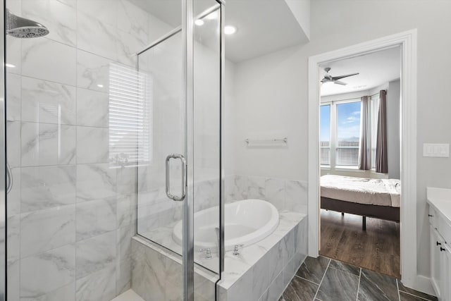 4121 Crossroads Ct, Oak Point, TX 75068 - ensuite bathroom with a bath, a stall shower, vanity, a ceiling fan, and marble finish flooring