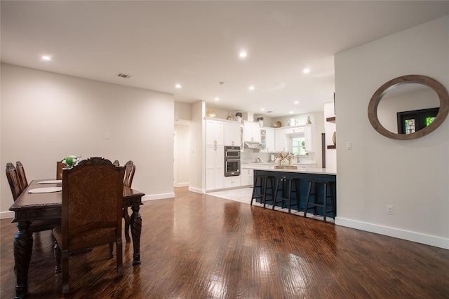 509 Farine Dr, Irving, TX 75062 - dining space with wood finished floors, baseboards, and recessed lighting