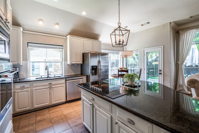 1433 Rogers Ct, Allen, TX 75013 - kitchen featuring appliances with stainless steel finishes, a sink, tasteful backsplash, white cabinets, and recessed lighting