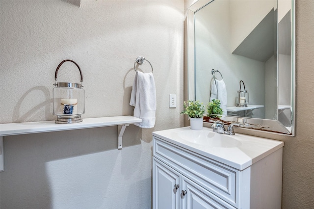 1433 Rogers Ct, Allen, TX 75013 - bathroom featuring vanity and a textured wall